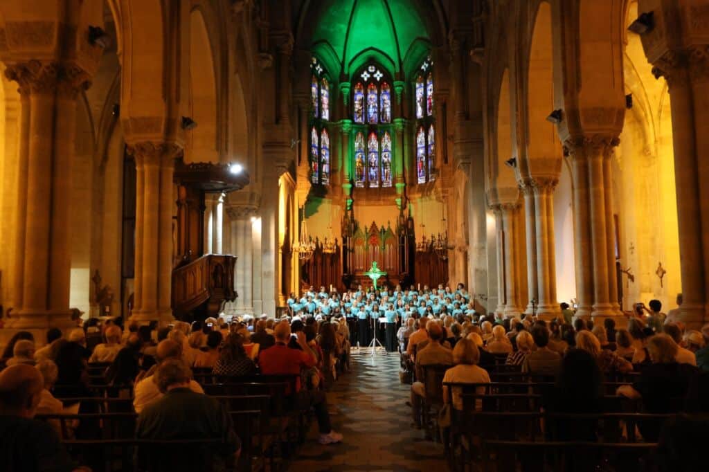 Students preparing for a choral performance with conductor