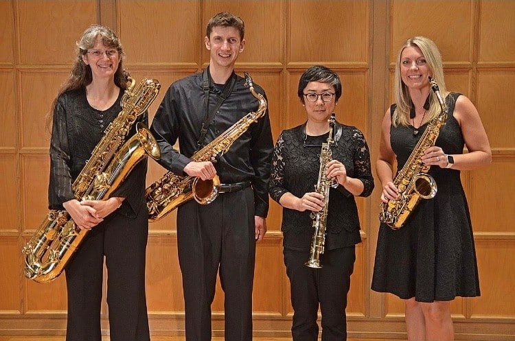 Barbara Brown Director of Orchestras performing with saxophone quartet