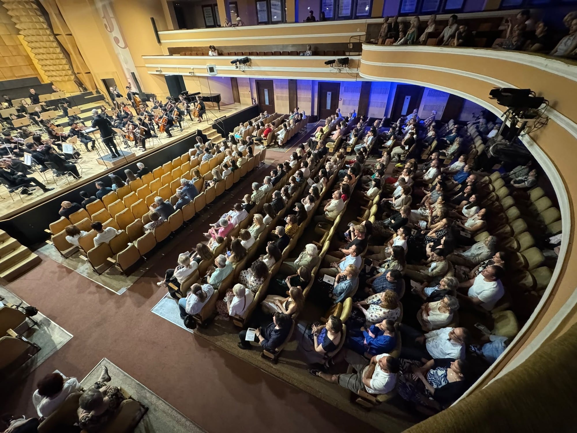 Sacramento Youth Symphony performing before a full audience in Timișoara, Romania