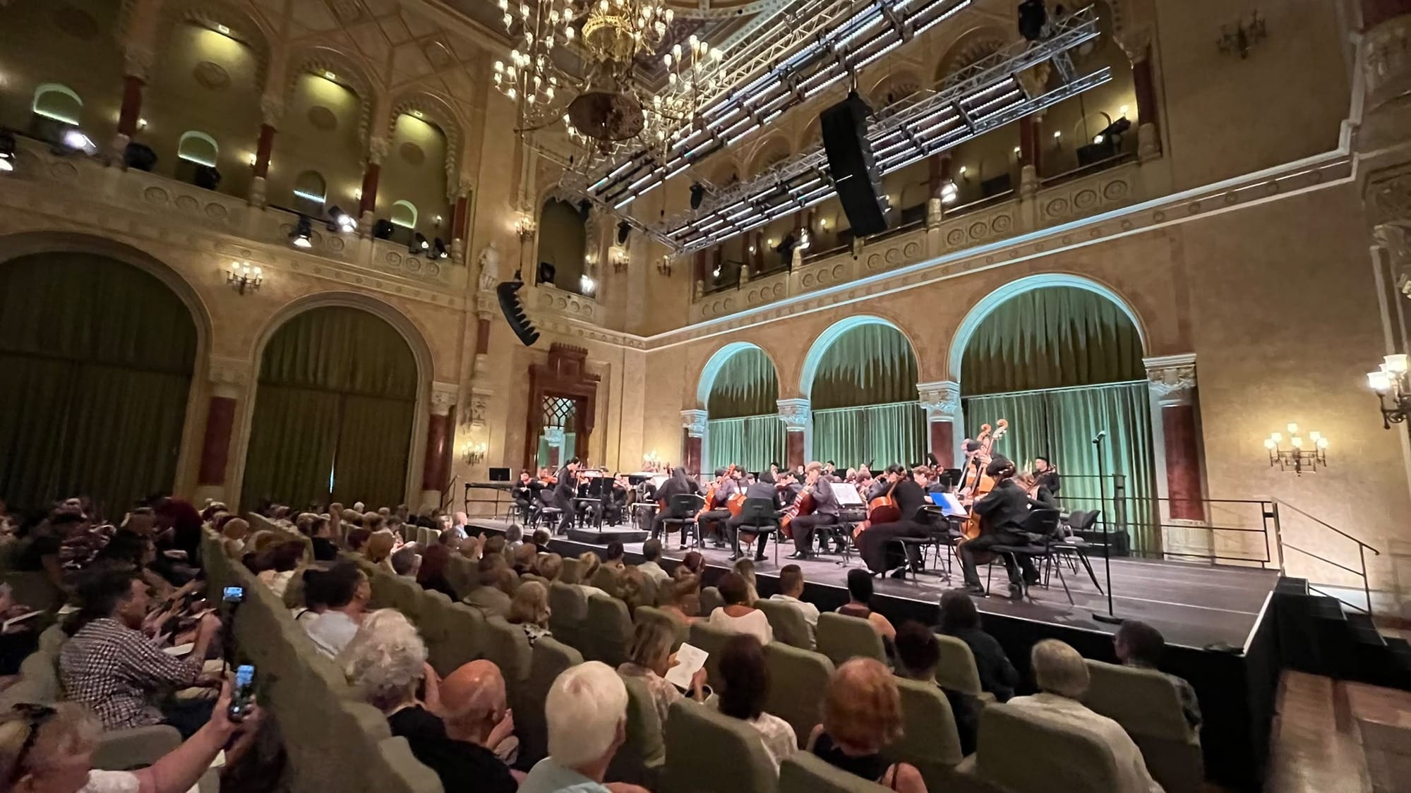 Sacramento Youth Symphony performing for an audience at Vigado Hall in Budapest