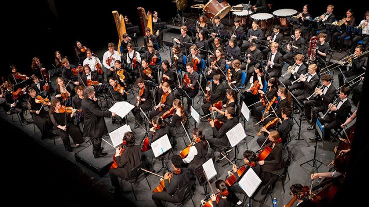 Orchestra performing on stage at Symphony Center in Chicago